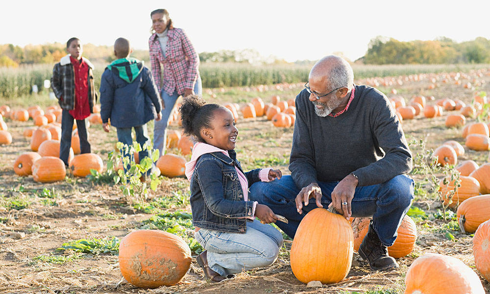 family at pumpkin patch