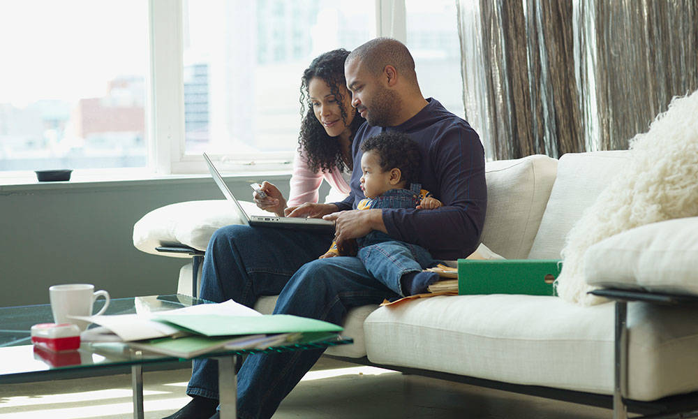family of 3 shopping online from home