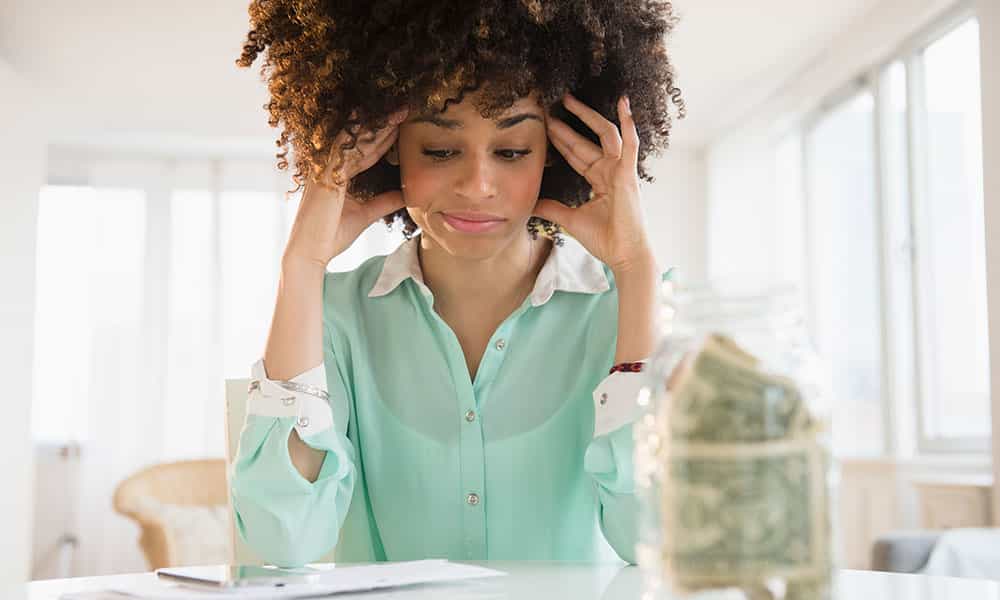 female frustrated going over personal financial picture