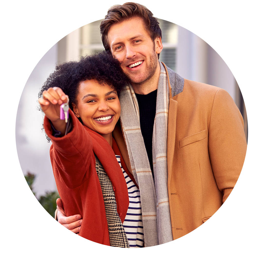 couple holding house keys