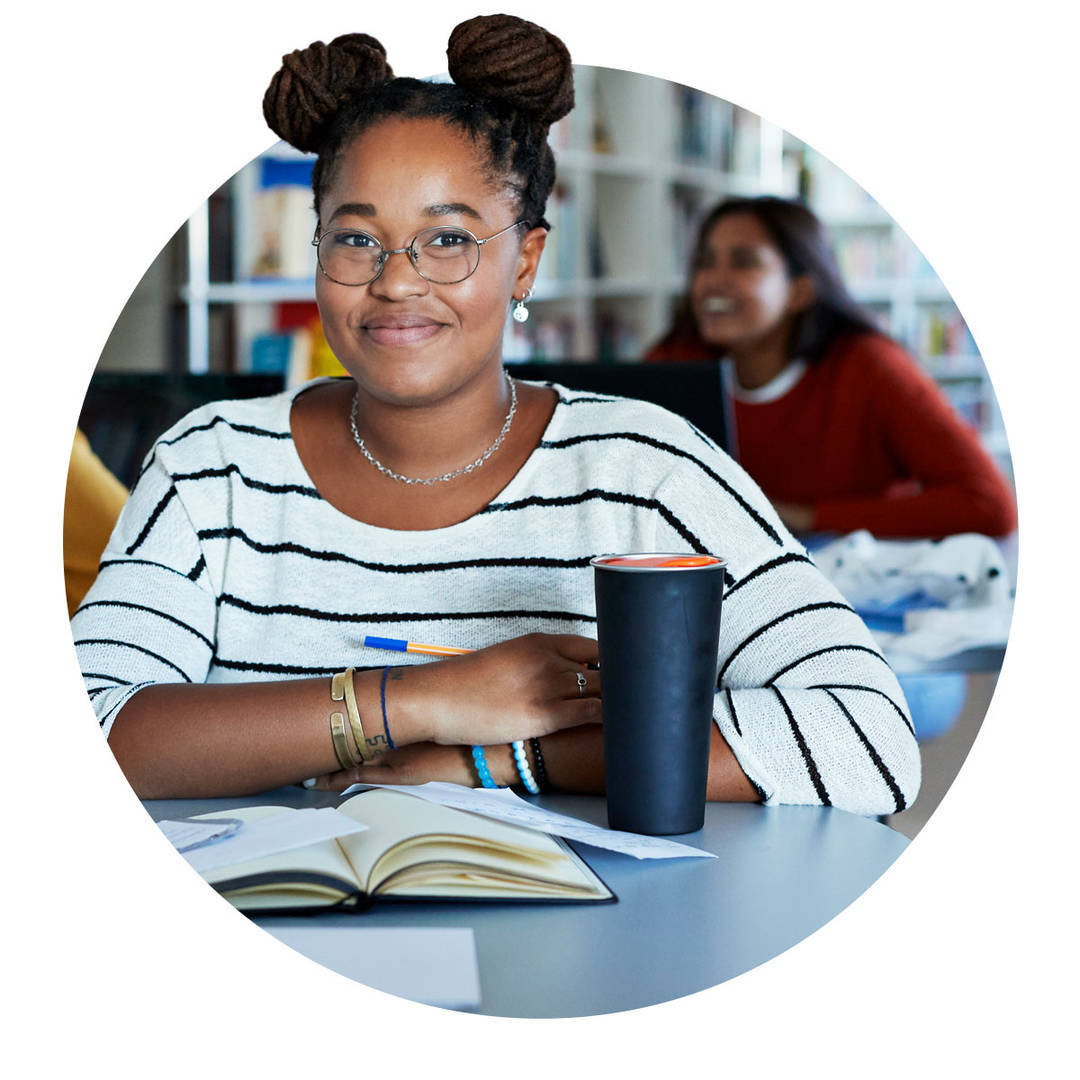 college student with a coffee on the table