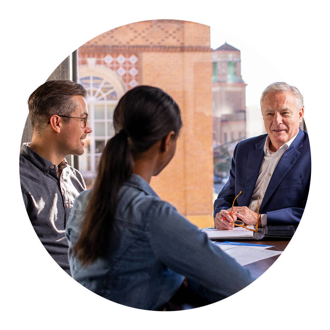 couple meeting with insurance advisor