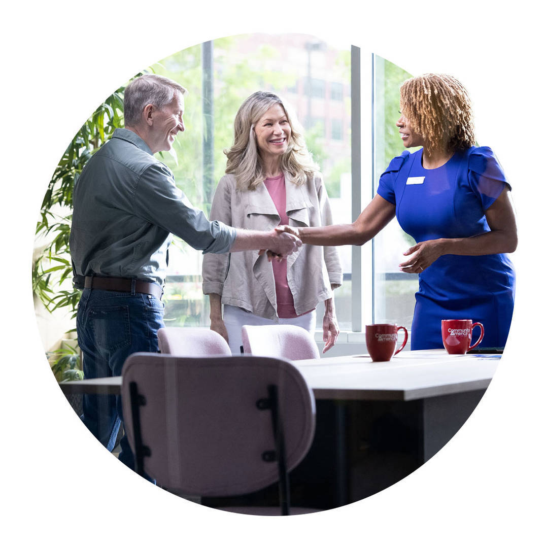 Older couple having a meeting with a financial advisor.