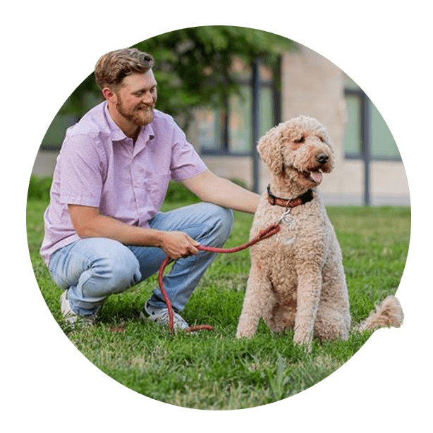 Man and his dog enjoying the nice spring weather.